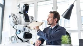 Business leaders in Davos believe that company executives will soon need to manage AI employees alongside human workers