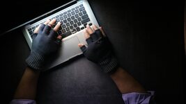 An attacker infected a popular npm package with over 150,000 downloads per week. How did the malware steal tokens and infect other projects?