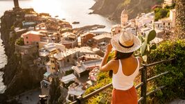 Instead of relaxing, a product designer invented an app that generates fake summer vacation photos. How it works