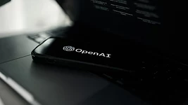 An OpenAI employee installed a listening device in the top management meeting room. The traitor was discovered by AI experts and has already been arrested by the FBI.
